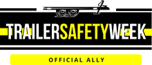 The logo for trailer safety week is black and yellow.