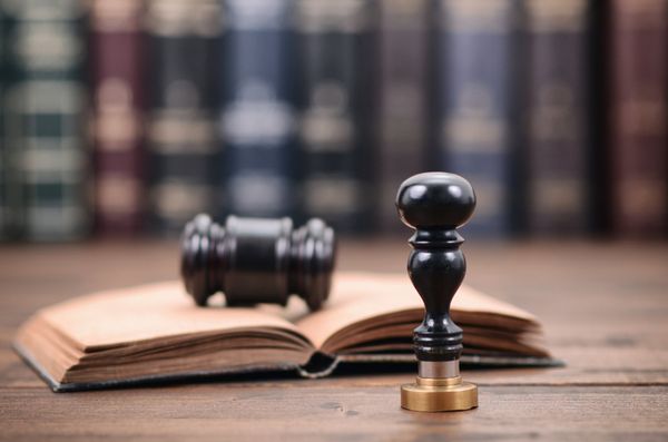 Stamp and Book — Shawano, WI — Greenhill Law Office