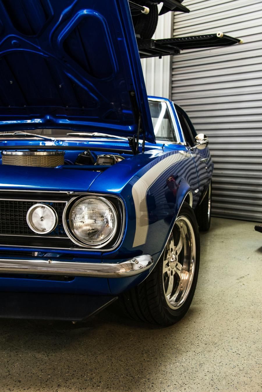 A Blue Car With The Hood Up Parked in A Garage — Landsborough Mechanical In Landsborough, QLD