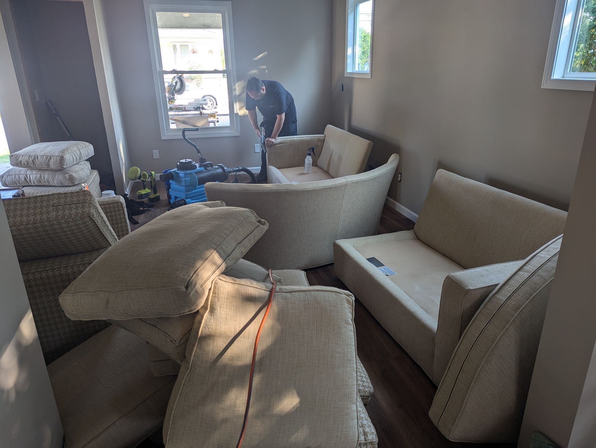 Couch being cleaned