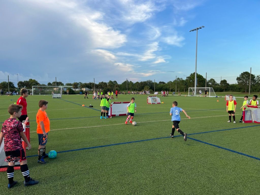 Space Coast United Soccer rec kids playing soccer