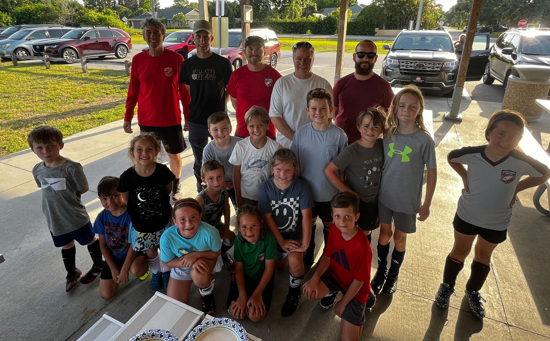 Space Coast United Soccer girls soccer team celebrating
