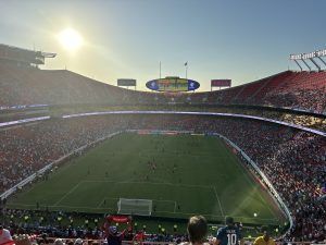 Soccer match in a packed stadium\