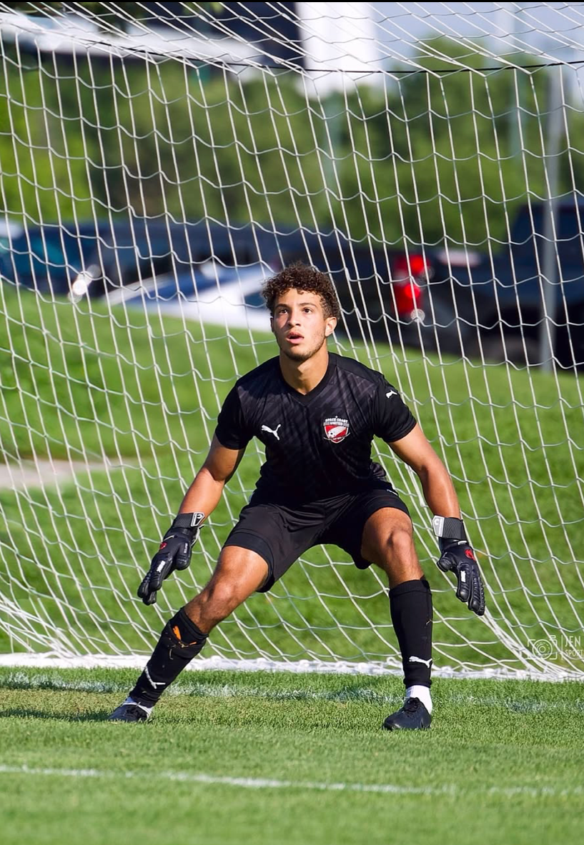 Boy playing soccer for Space Coast United Soccer