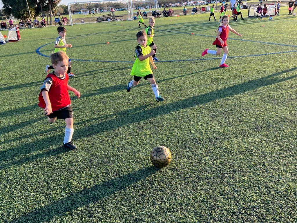 Space Coast United Soccer children practicing soccer