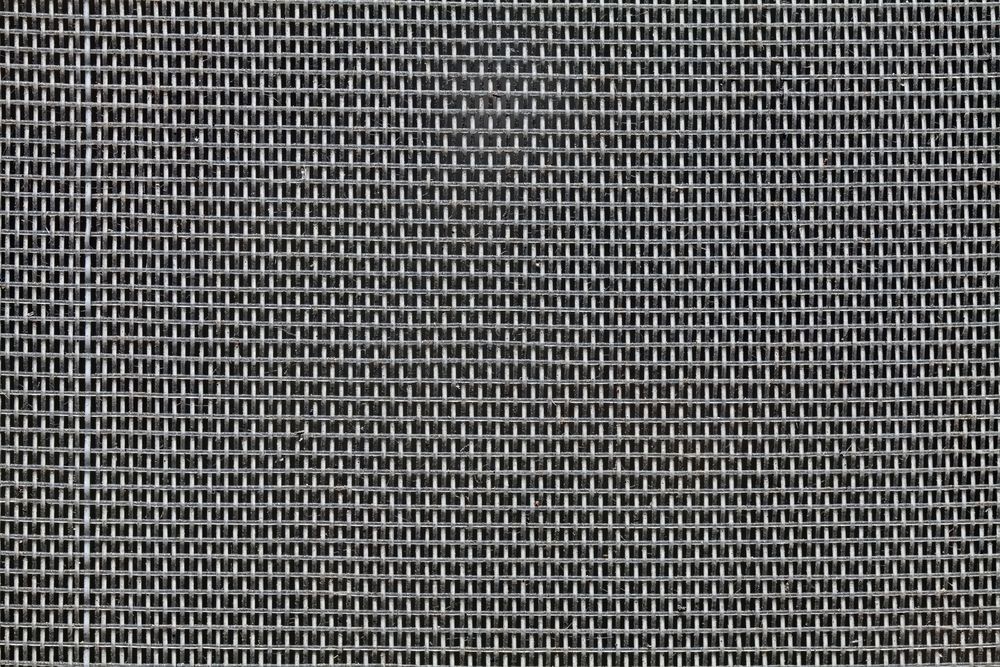 Close-up of a Fine-mesh Gray Wire Screen With a Uniform — Australian Flyscreens & Security Doors in Newcastle, NSW