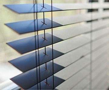 Close-up of Dark Window Blinds — Australian Flyscreens & Security Doors in Toronto, NSW