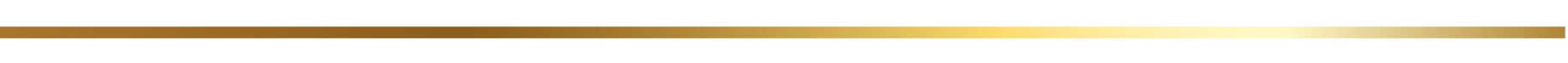 A blurred image of a gold ribbon on a white background.