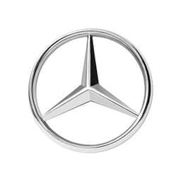 Mercedes-Benz logo: a silver three-pointed star within a silver circle.