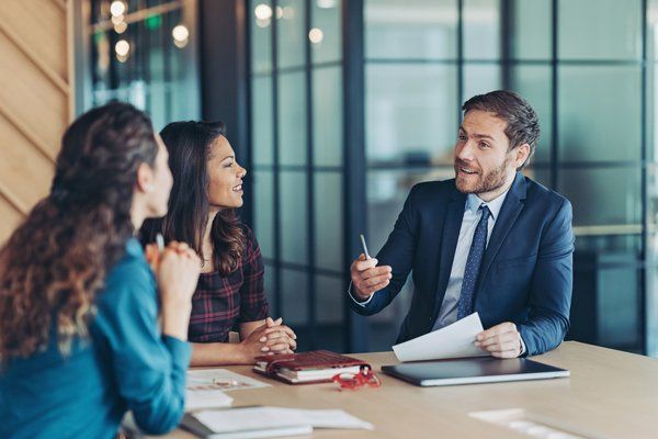 Professional Accountant With His Clients — Wisconsin Rapids, WI — Becker & Kumm CPA Professional Accountant With His Clients — Wisconsin Rapids, WI — Becker & Kumm CPA