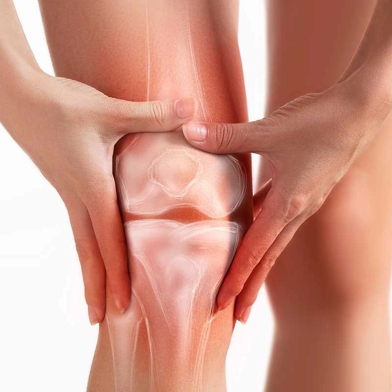 Someone holding a painful knee