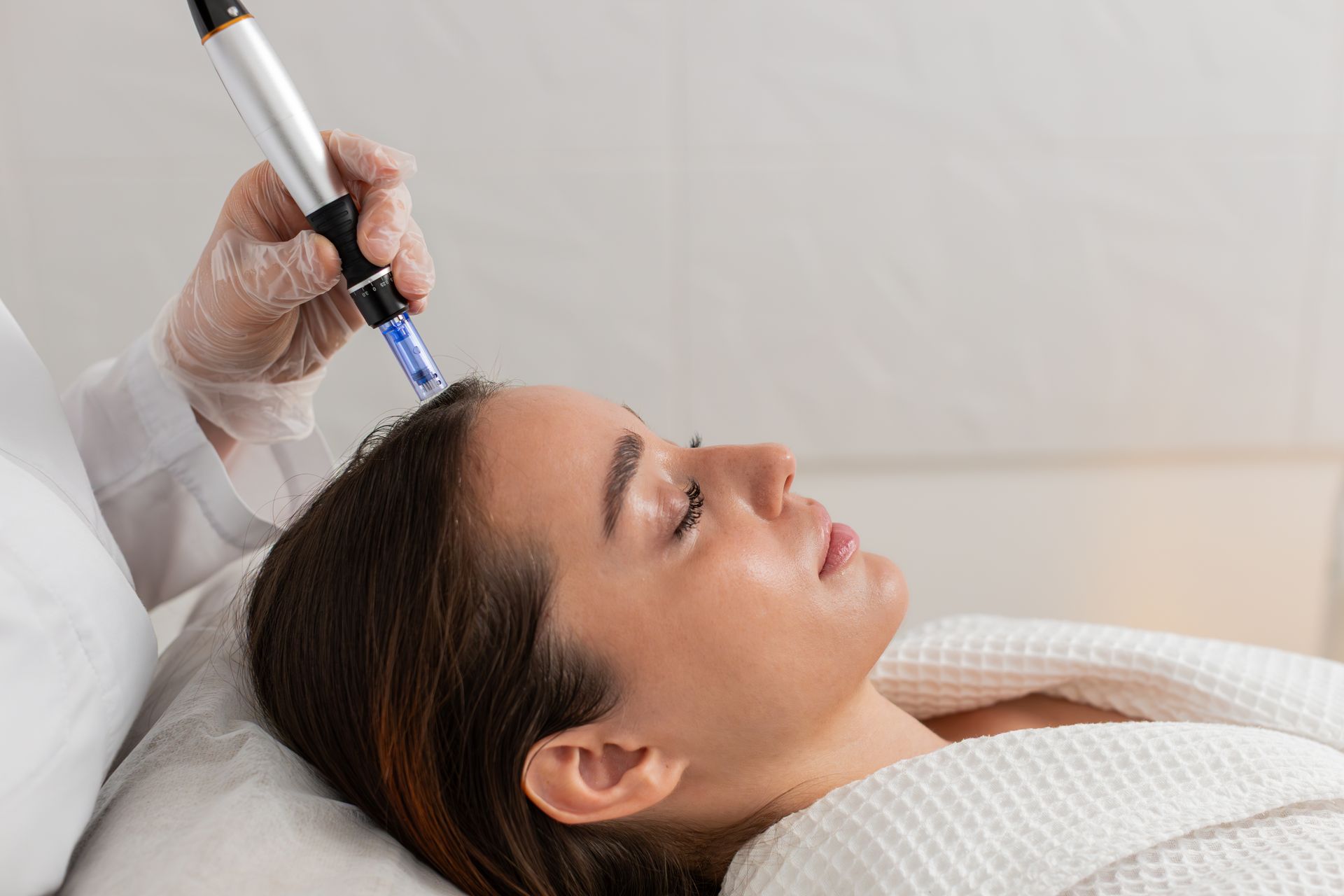 woman getting microneedling