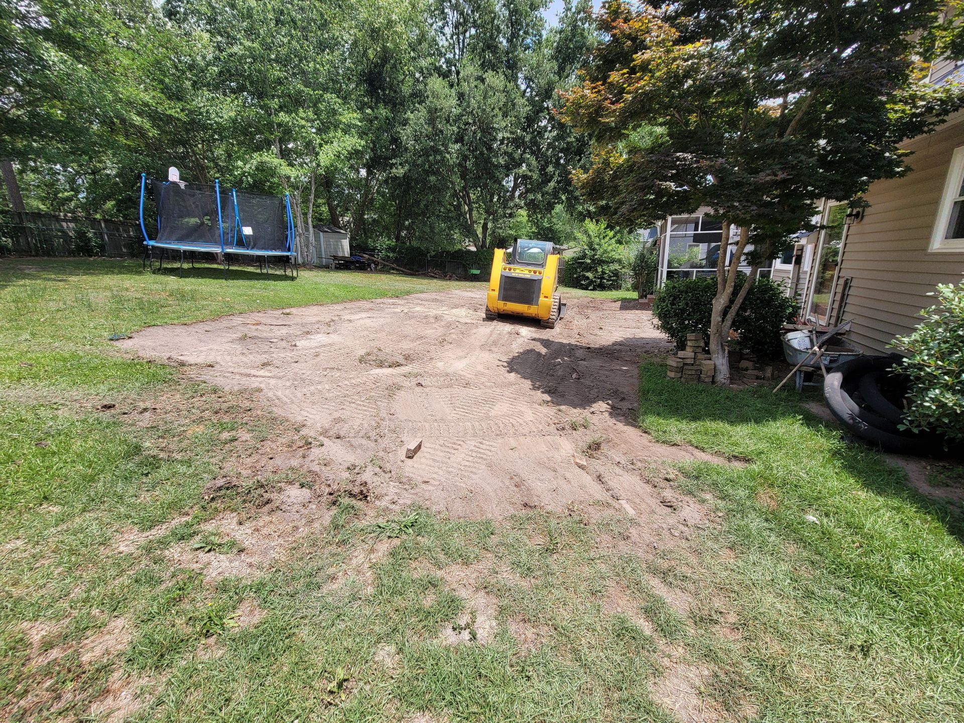 before image of walkway between the house and fence