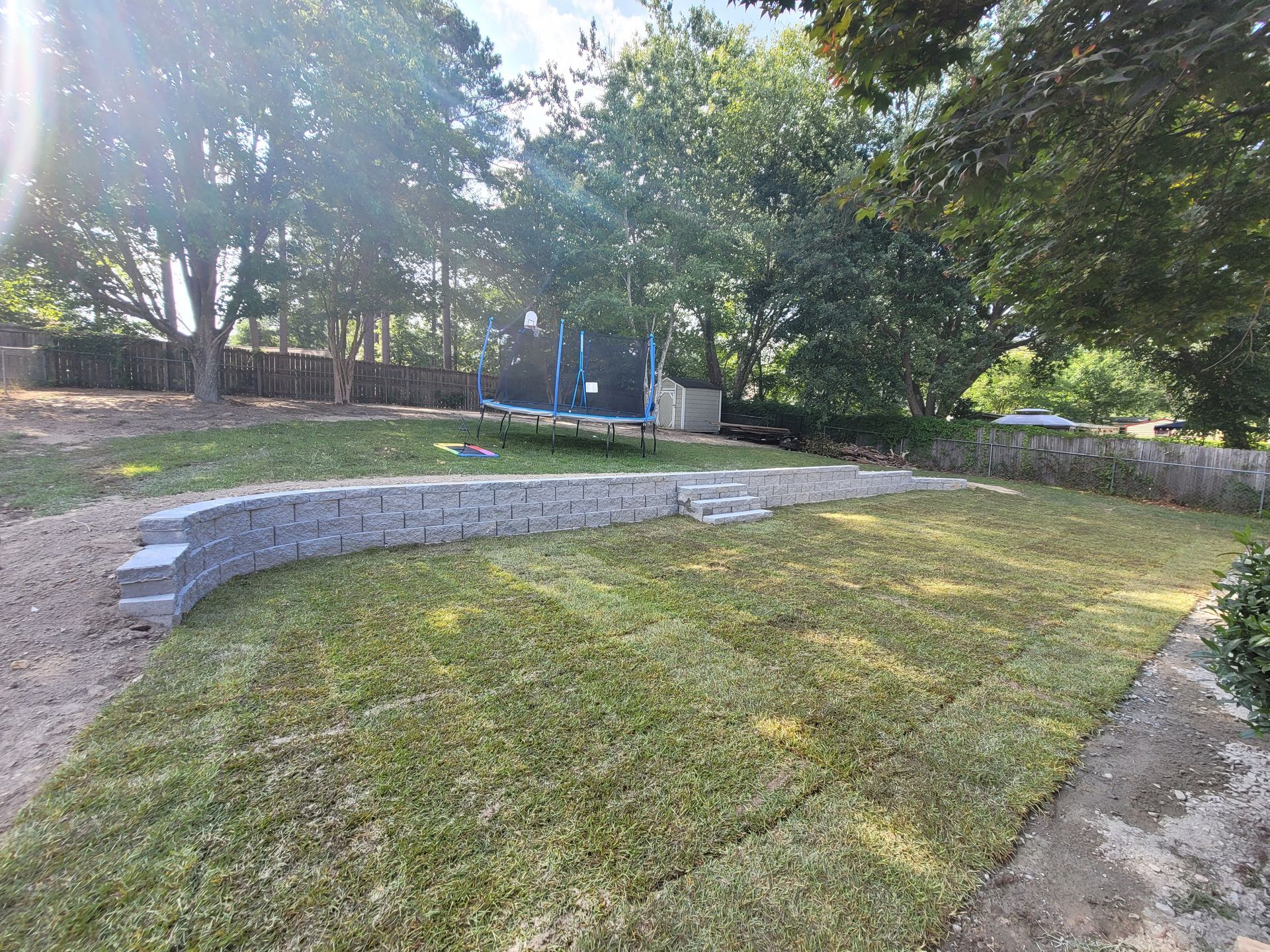 after image of walkway between the house and fence