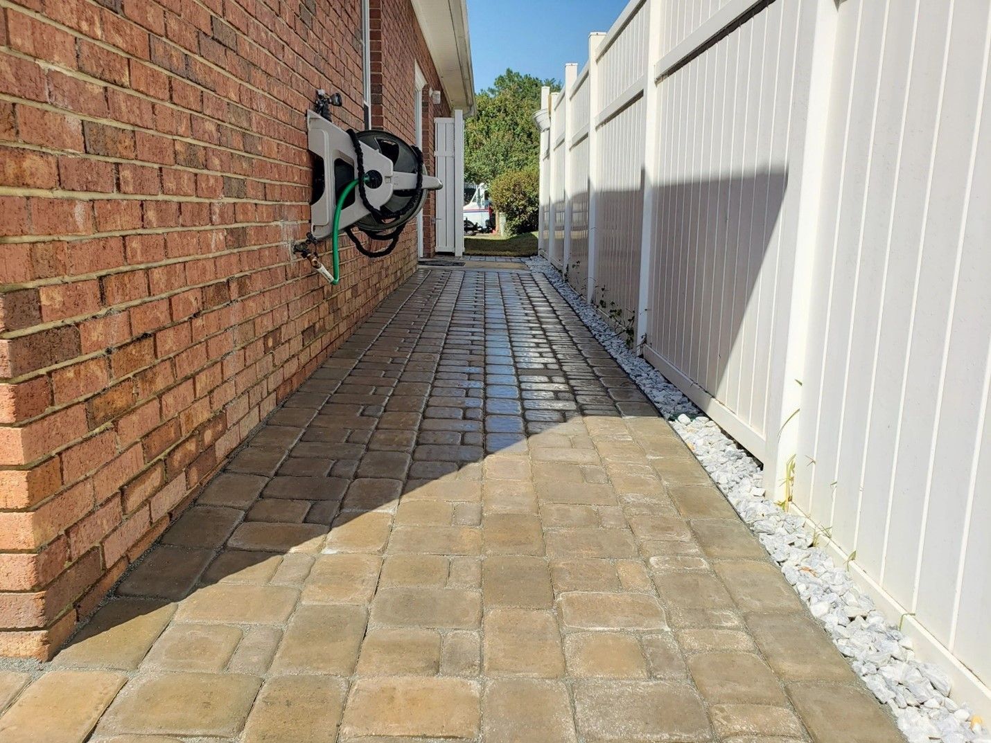 after image of walkway between the house and fence