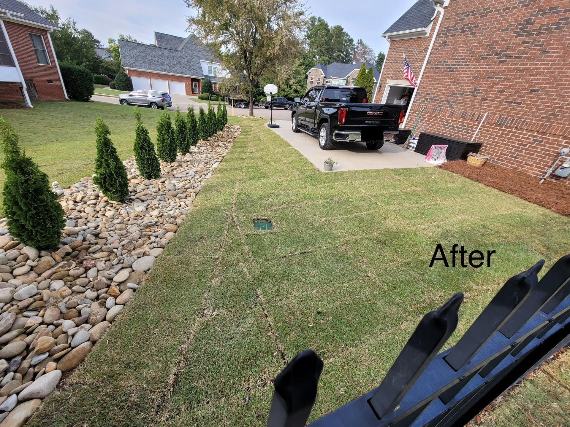 after image of a house backyard renovated with hardscape