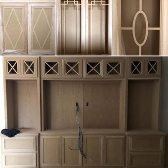 Large, light-colored wooden wall unit with cabinet doors featuring various geometric grille patterns.
