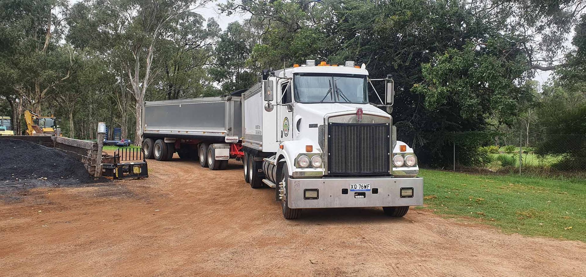 White truck driving down a dirt road | Toowoomba, QLD | Jasmond Transport