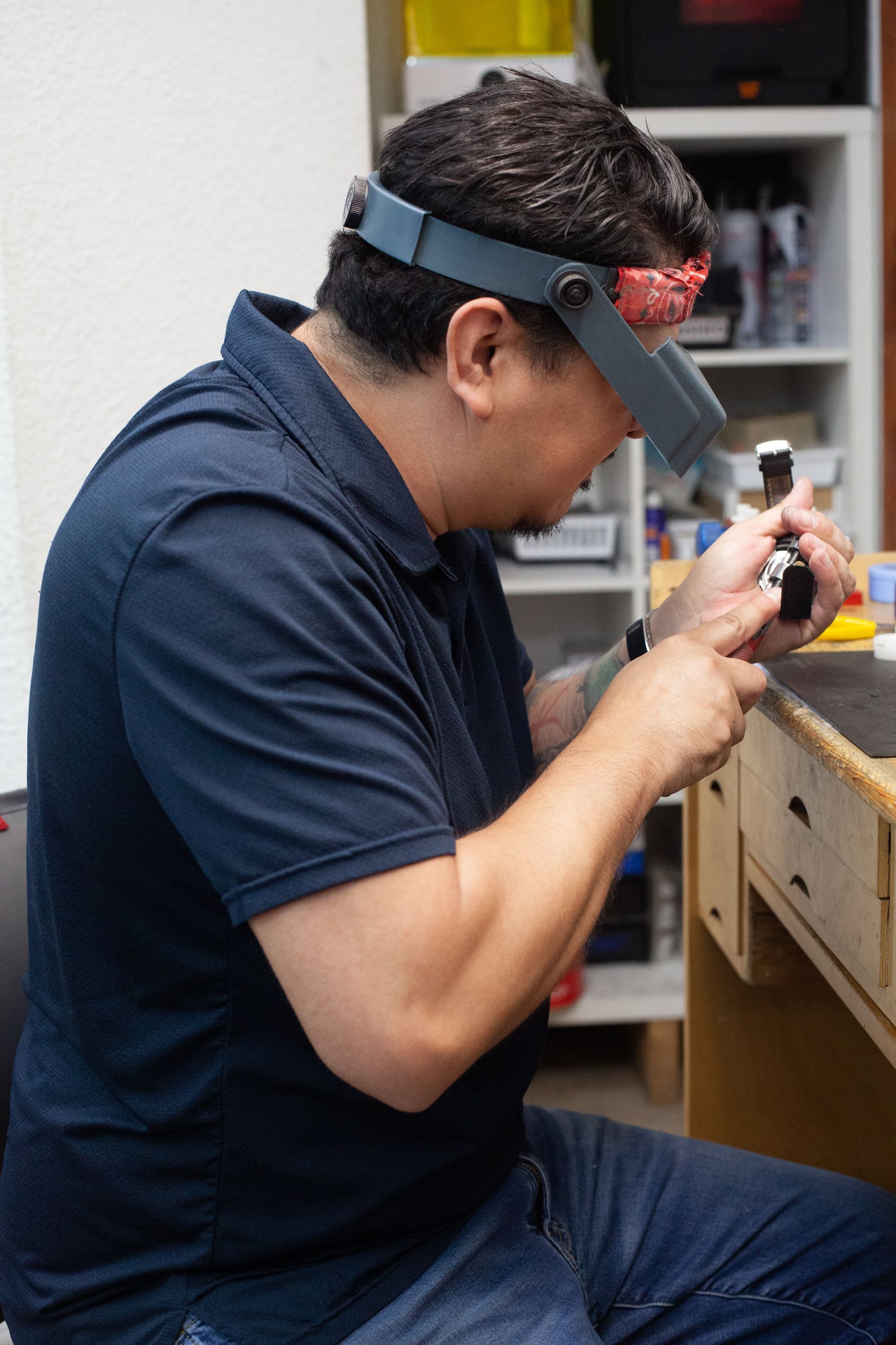 watchmaker repairing an old watch
