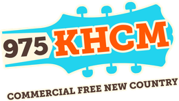 975 KHCM radio logo in orange and brown on a turquoise guitar pick, with “Commercial Free New Country” text