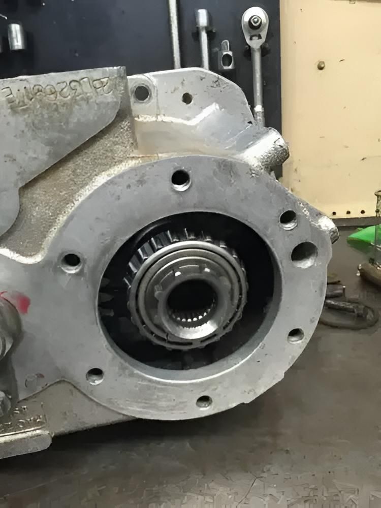 A Close Up of a Metal Object With a Bearing in It on a Table — Land Rover Spares In Mackay, QLD