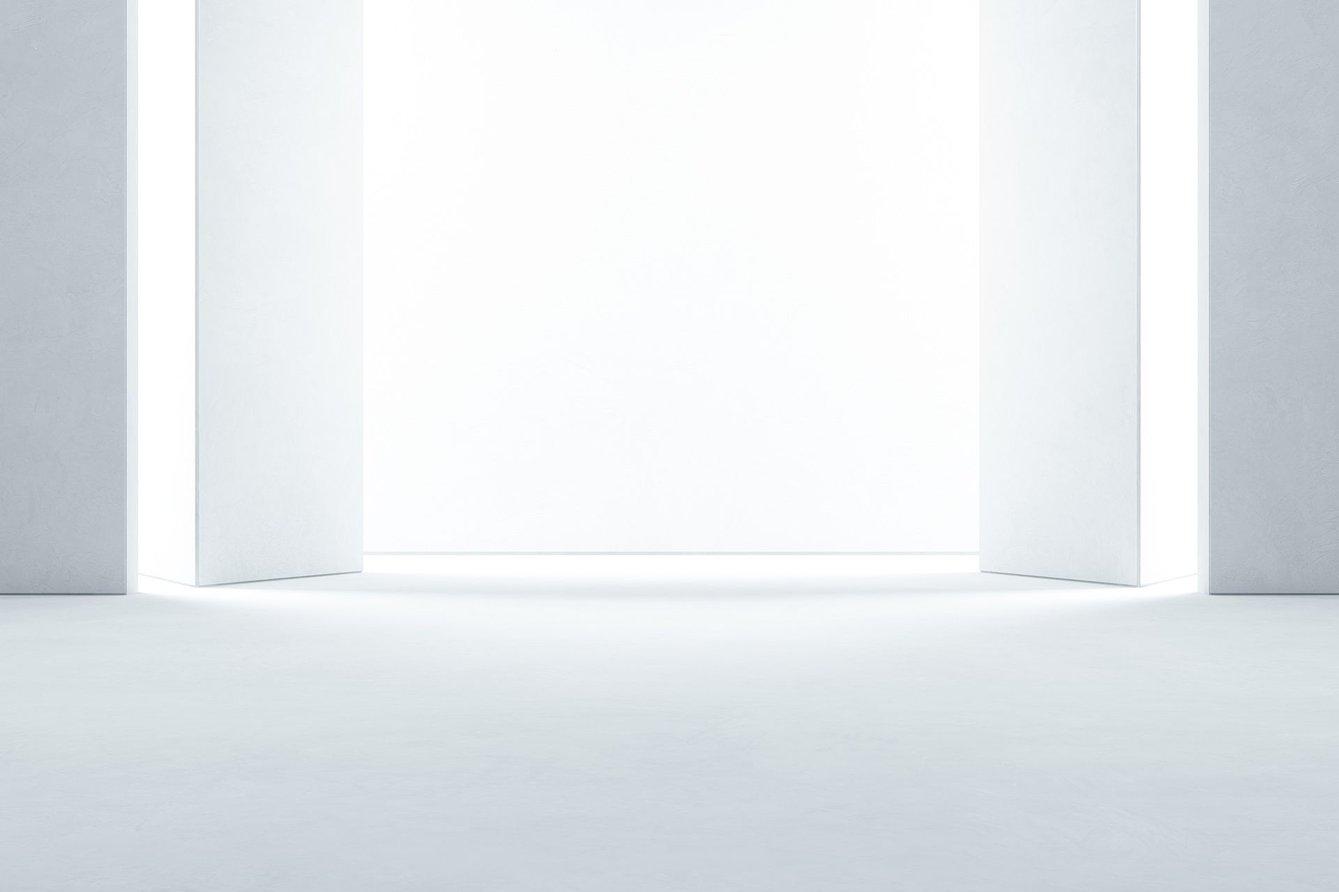 Una habitación blanca con una ventana y una luz que entra por ella.