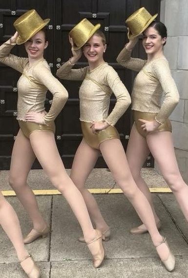 Girls tapdancing infront of door