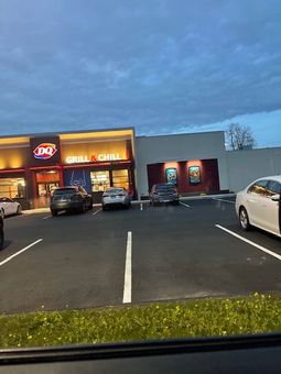 Leveling Fresh Asphalt On a Road — Glastonbury, CT — American USA Paving