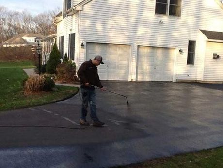 Compacting Asphalt At Road Repair Workers On Asphalting Road — Glastonbury, CT — American USA Paving