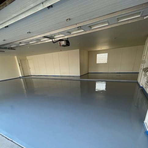 Solid color floor coating in a two-car garage