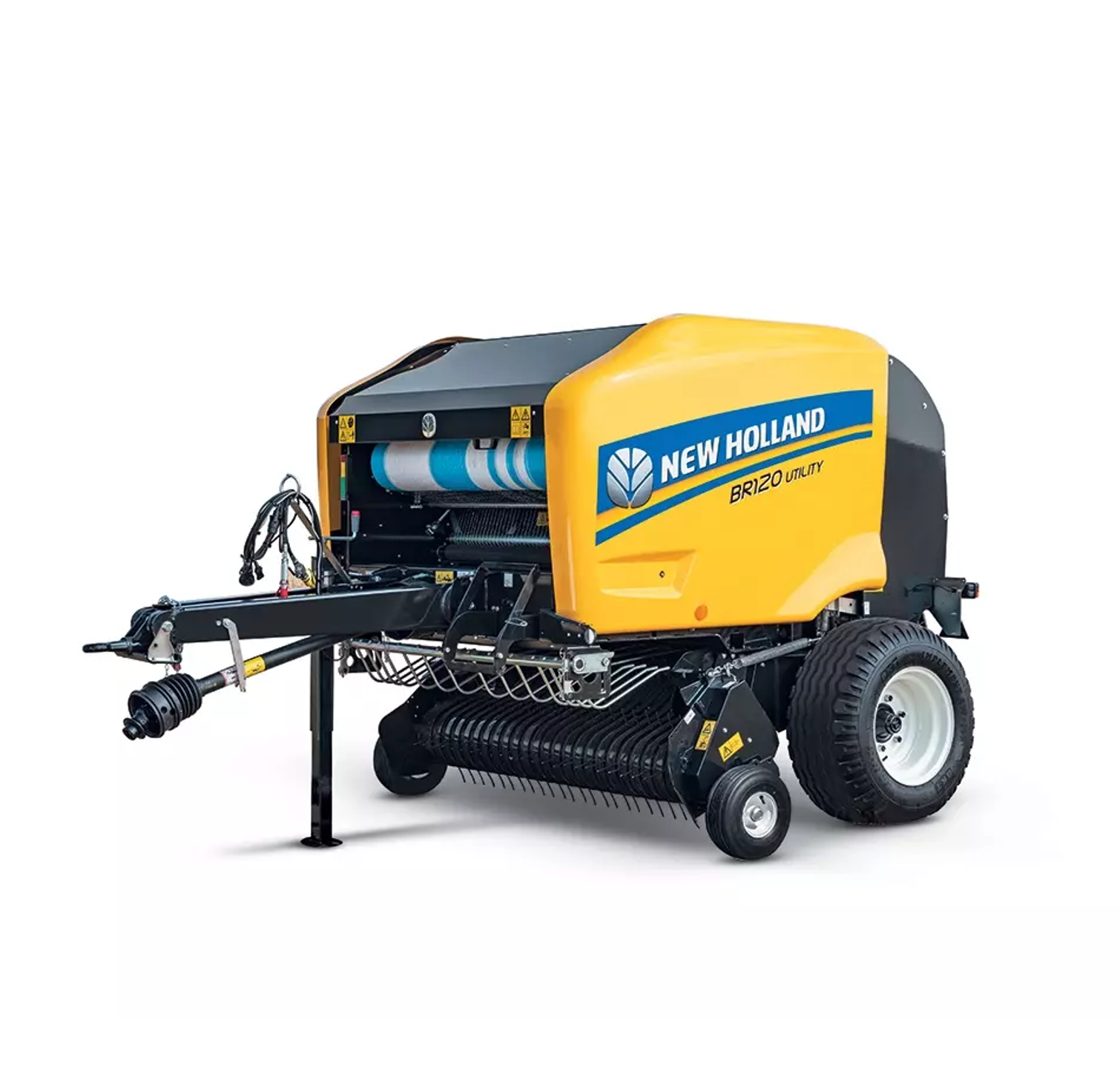 Una empacadora de pacas redondas New Holland con un remolque acoplado a ella