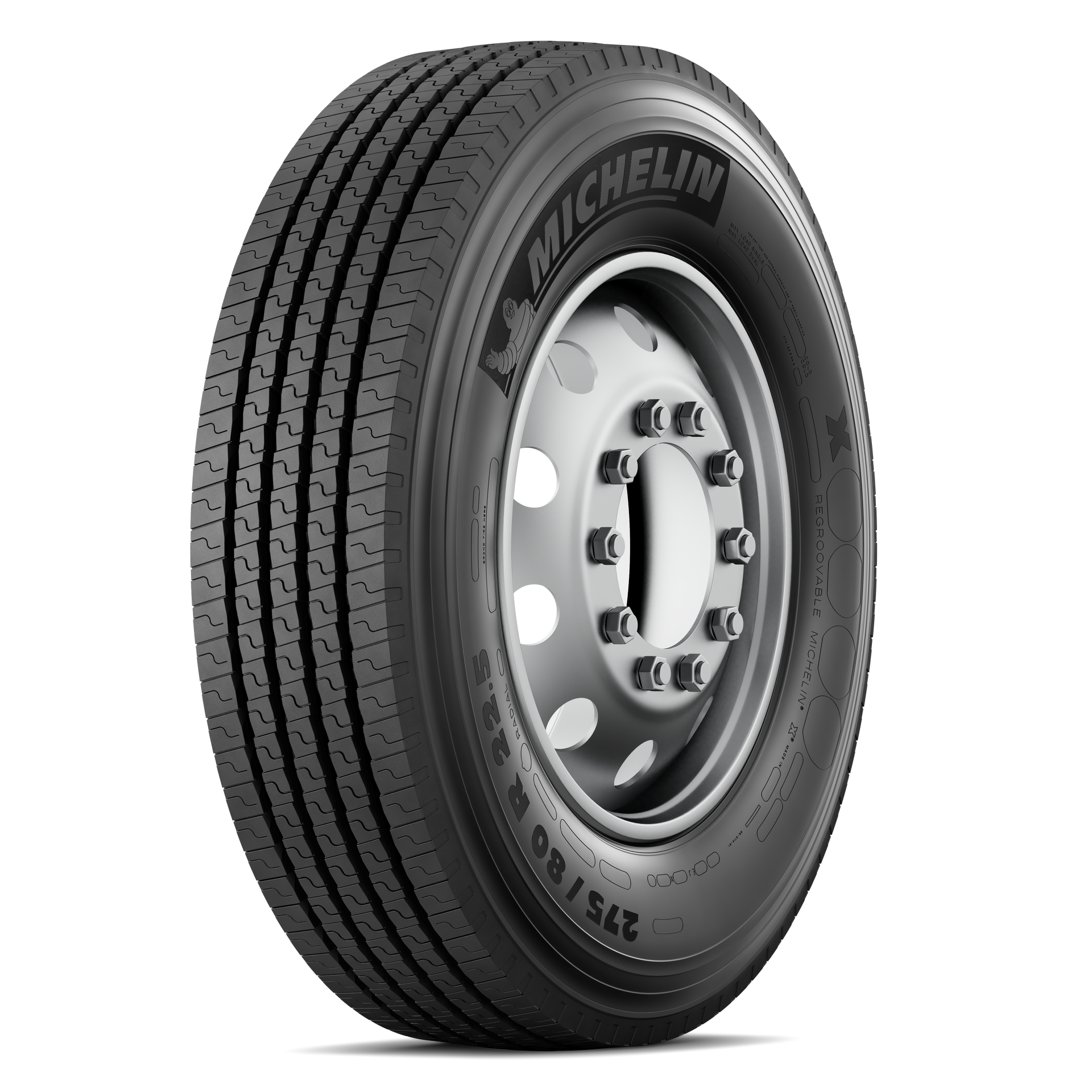 Primer plano del neumático delantero y la llanta de un automóvil en una calle oscura, neumático Michelin.