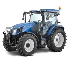 Un tractor azul está sentado sobre una superficie blanca.