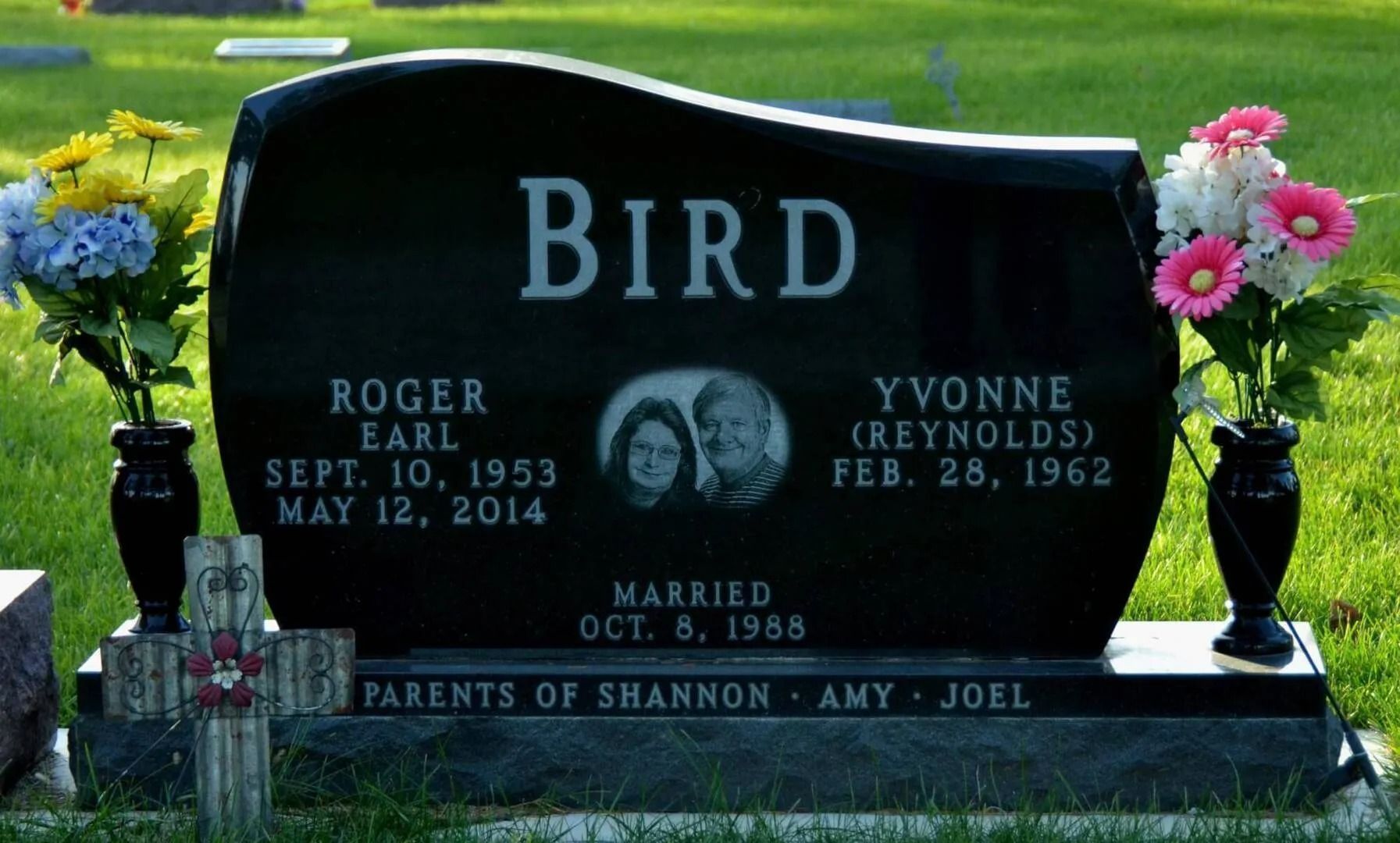 Black gravestone engraved