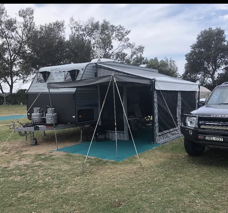 A Truck Is Parked in Front of A Trailer with A Tent Attached to It - Quality Canvas Products In Illawarra, NSW