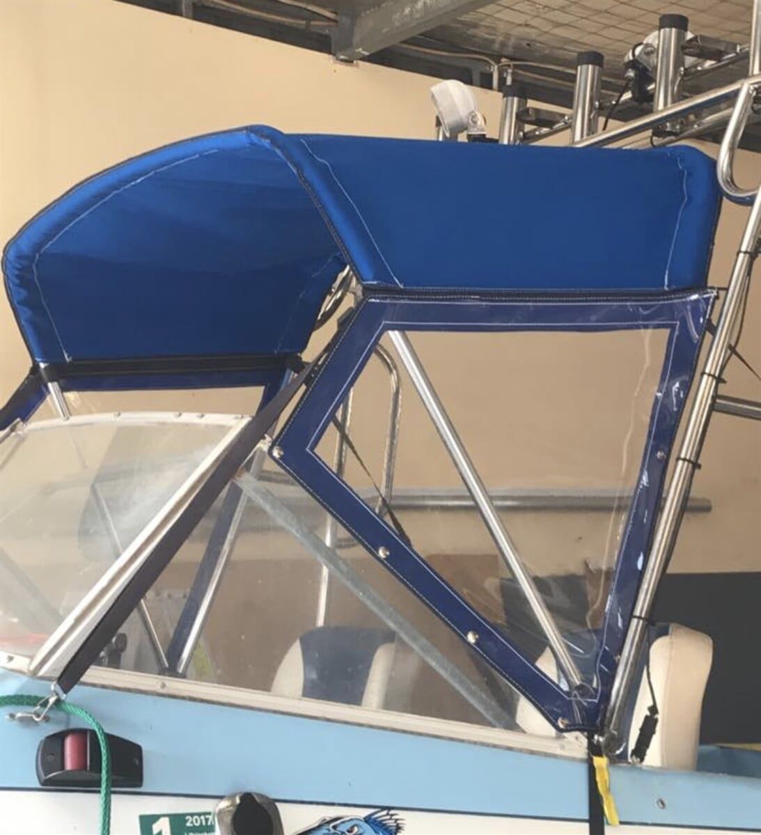 A Boat with A Blue Canopy on Top of It - Quality Canvas Products In Illawarra, NSW