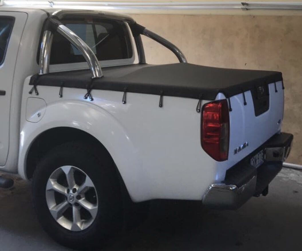 A White Truck with A Black Cover on The Bed - Quality Canvas Products In Illawarra, NSW