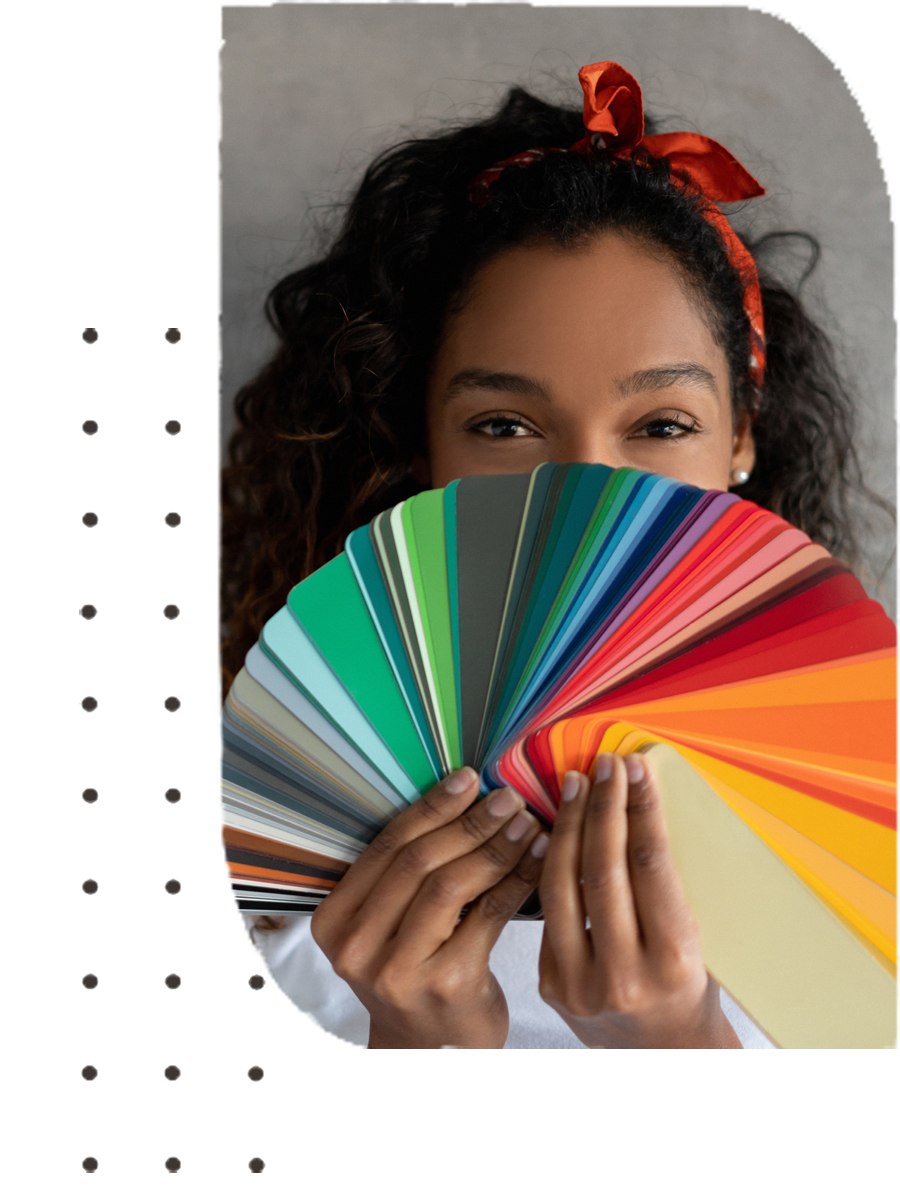 A woman with a paint brochure in their hand | Sydney, NSW | Polypaint A woman with a paint brochure in their hand | Sydney, NSW | Polypaint