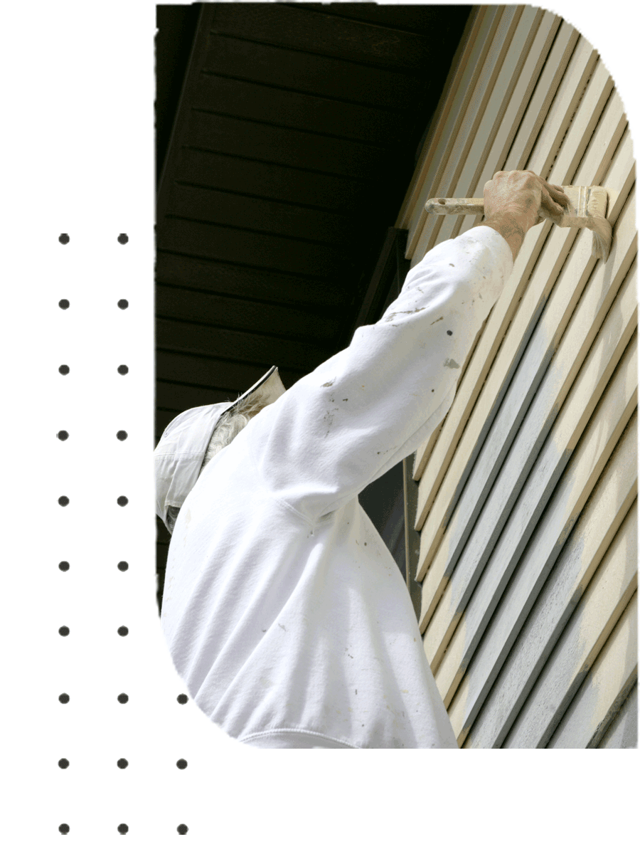 A man with a white shirt brushing a wall with paint | Sydney, NSW | Polypaint A man with a white shirt brushing a wall with paint | Sydney, NSW | Polypaint