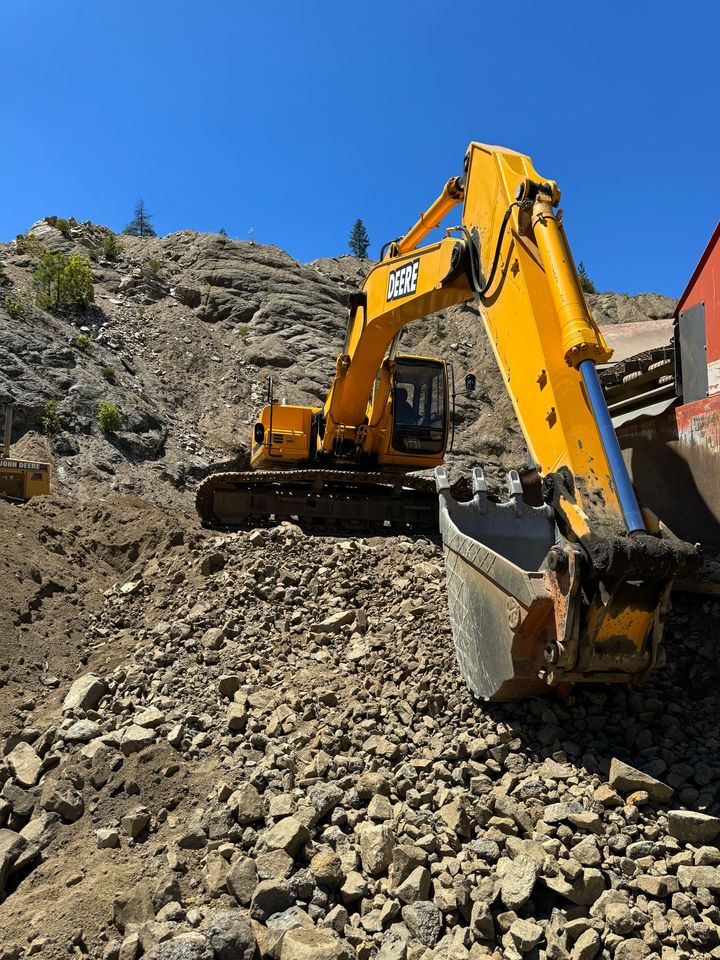 Large excavator in May Rock's granite rock pit in Ashland, Oregon.