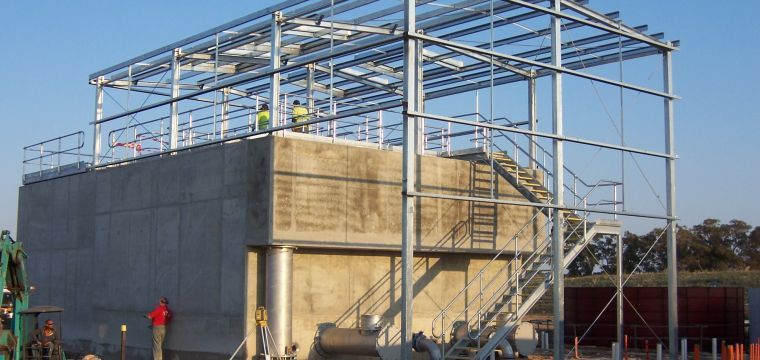 A Building Under Construction With Stairs And A Metal Structure — TMF Engineering In Cobram, VIC