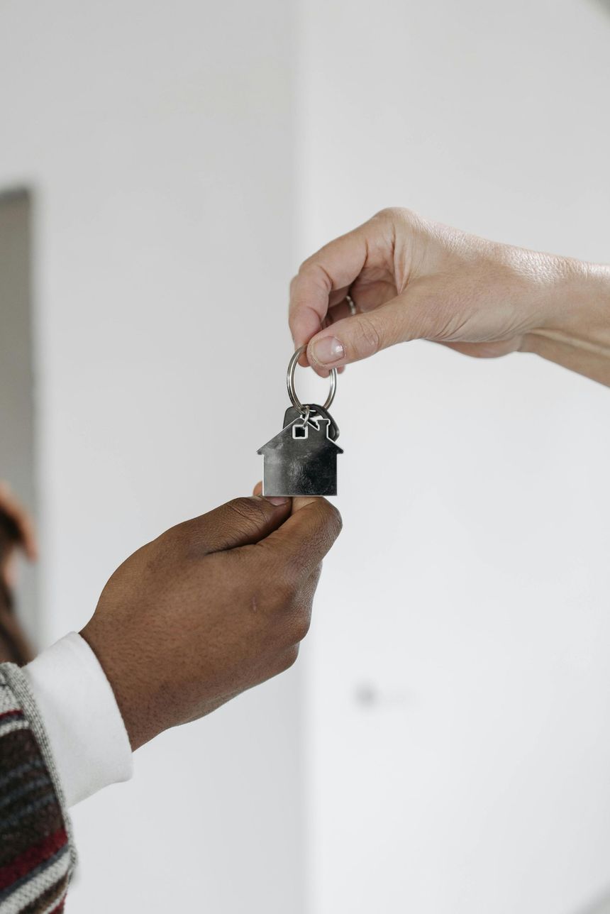 Client receiving house keys after building inspection in Sydney.