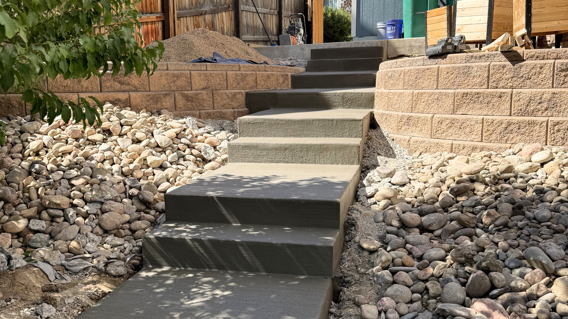 Freshly poured concrete steps curing on a mild day in Northern Denver
