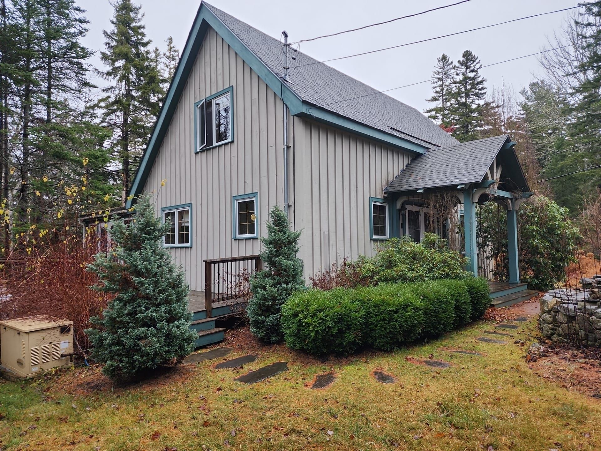 A house with a roof that is covered in shingles