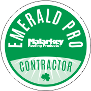 A green emerald pro contractor sticker with a clover on it.