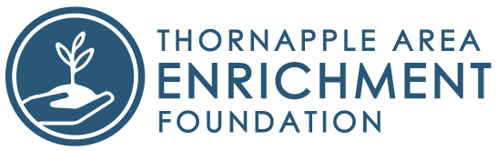Thornapple Area Enrichment Foundation logo with a white sprouting plant in a blue circle
