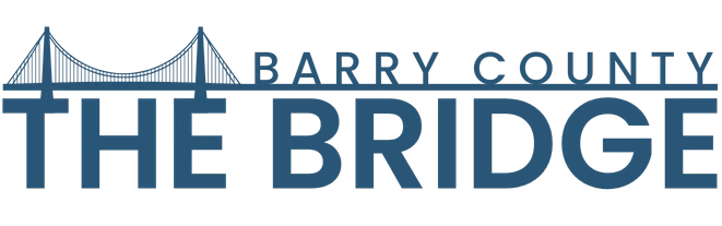 Barry County The Bridge logo with a blue suspension bridge illustration and navy text