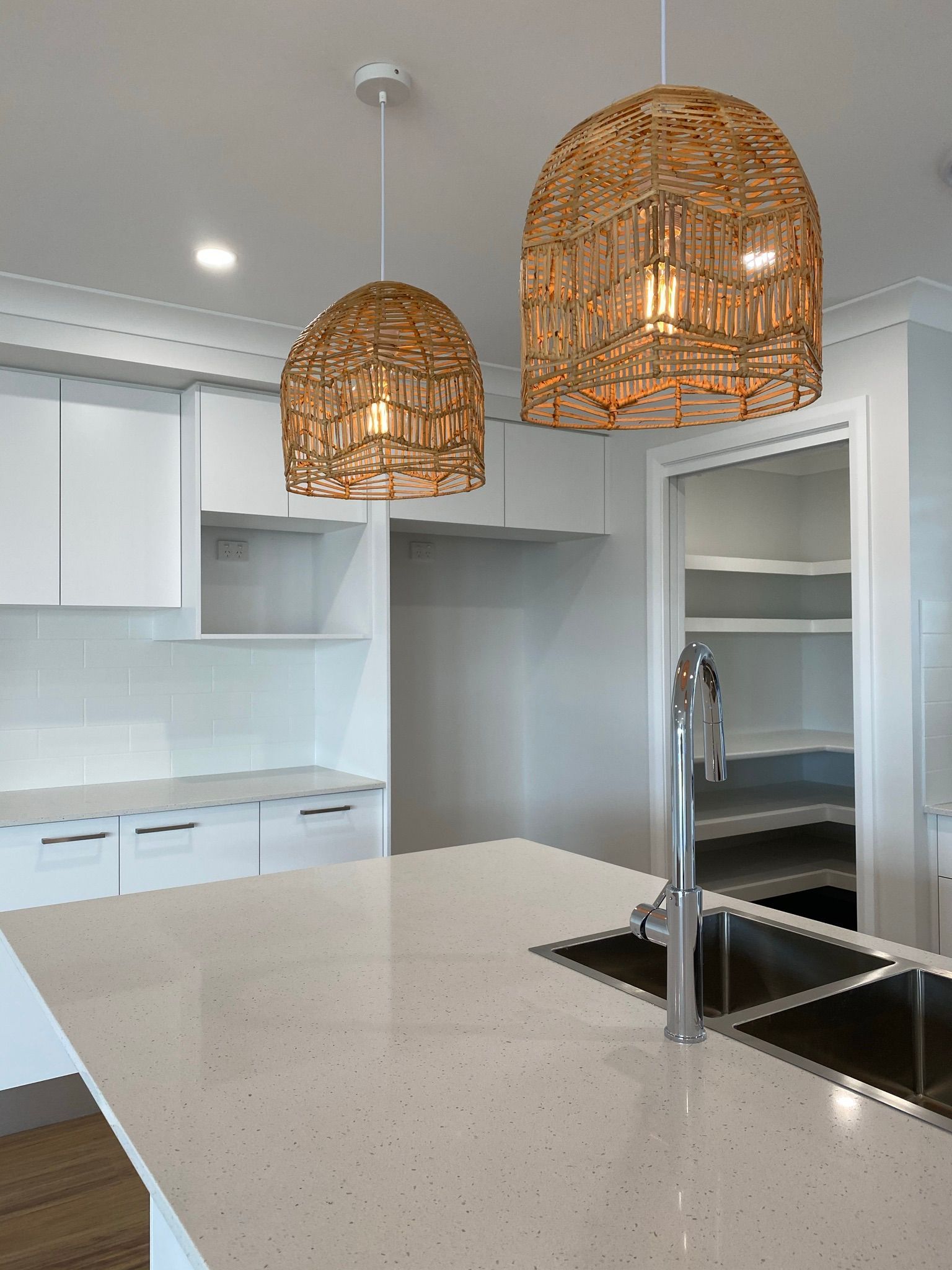 A Kitchen Detail With White Cabinets  — Kitchen Renovations in Dubbo, QLD