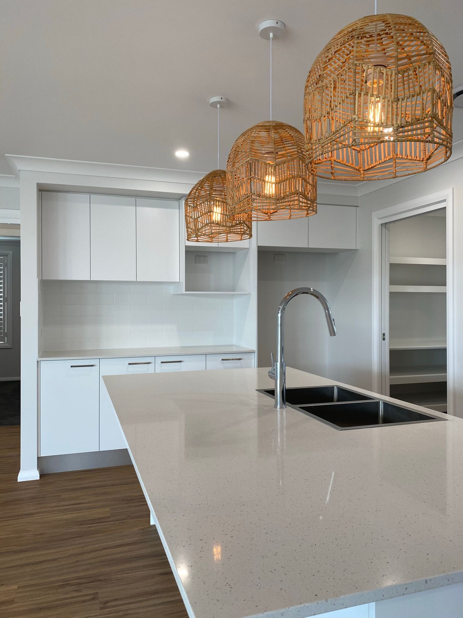 Cleaned Kitchen With Sink and Pendants Lights — Kitchen Renovations in Dubbo, QLD