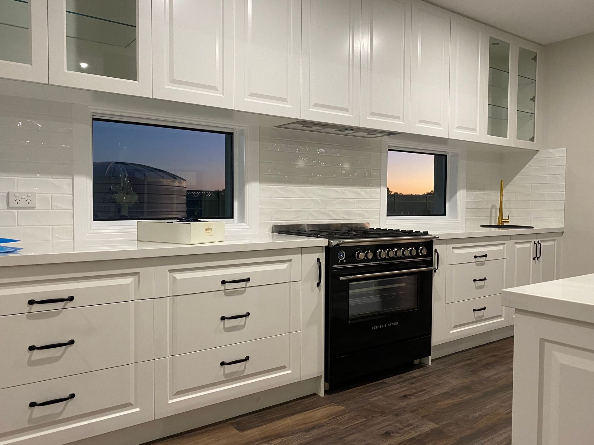 Side View of Kitchen Counter Top With Stove and Sink — Kitchen Renovations in Dubbo, QLD